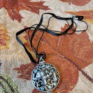Cute elephant hidden chamber necklace